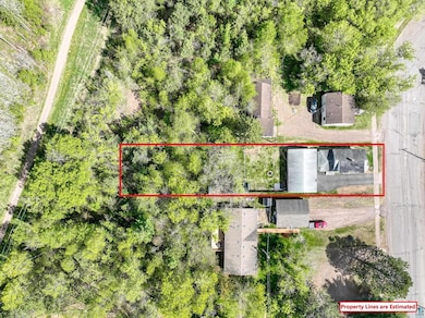 Aerial overview of property's location with property boundaries highlighted