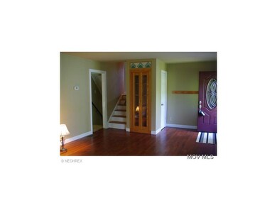 LR stairs lead to 3 bedrooms
