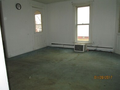 Dining room (14'x14') showing exit door to enclose