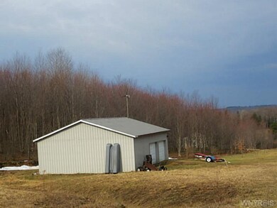 Garage. View of the garage. You can see the house 