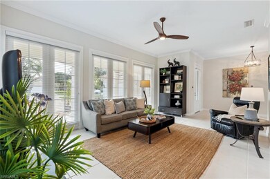 Living room featuring light tile patterned floors,