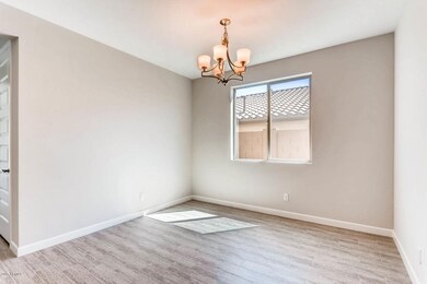 14339 W Charter Oak Rd-large-005-3-Dinin