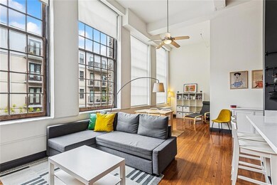 The living room creates a peaceful, grand space - and plenty of room to use the space in creative ways.