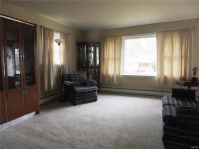 Spacious Living room with newer carpeting but if y