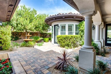 Front entry leads to beautiful courtyard with pave