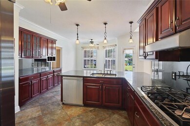Gourmet Kitchen features Granite Countertops, 5 Bu