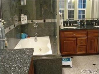 Remodeled master bathroom w/granite tops,jacuzzi b