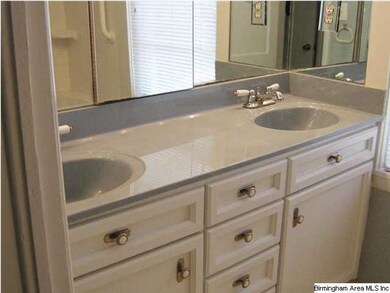 Master bath with double vanity and jetted tub
