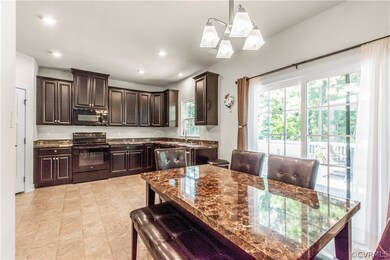 A spacious eat in dining area in the kitchen that