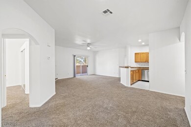 Unfurnished living room with visible vents, recess