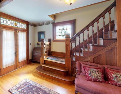 Foyer with Restored Wood Work and Stained Glass