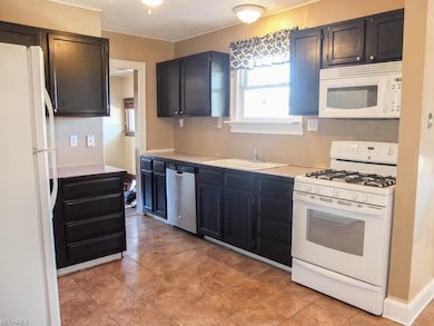 Fully applianced eat-in kitchen.