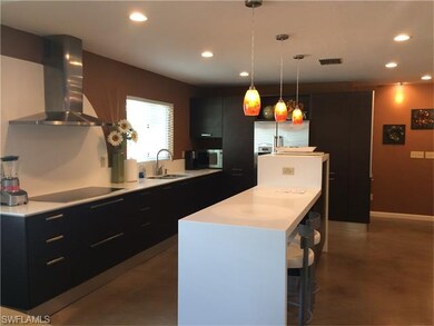 Gourmet kitchen with breakfast bar.