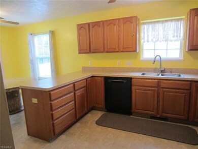 Large eat in kitchen with plenty of cabinets and c