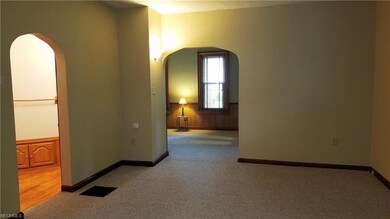 Dining room with view to living room and bath