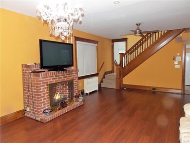 Livingroom/Dining room combo with gas fireplace.