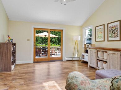 Family room with door to the rear deck