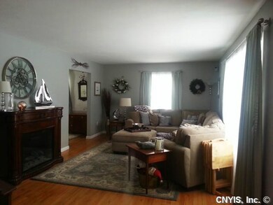 Living Room. The living room features gorgeous har
