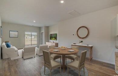 Dining room with light hardwood / wood-style floor