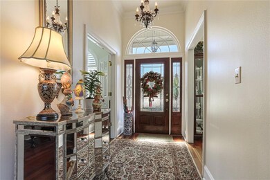 spacious foyer with leaded glass entry