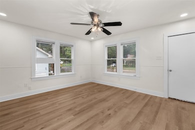 Spare room featuring light wood-style floors, recessed lighting, and ceiling fan