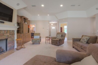 GREAT ROOM INCLUDES STACKED STONE FIREPLACE