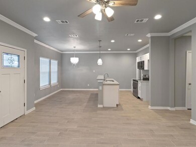 Open Living room into Kitchen