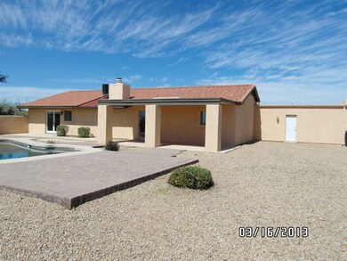 BACK W/EXTENDED BRICK PAVER PATIO