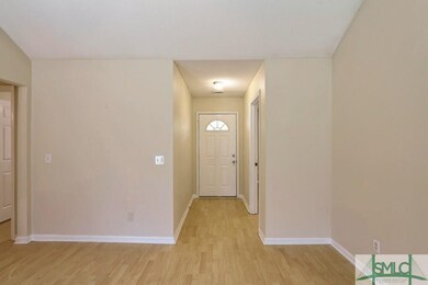Foyer Entrance ~ Laminate Wood Floors