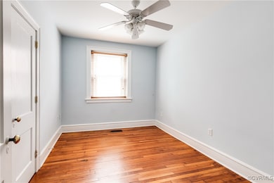 Unfurnished room with light wood-style flooring, a