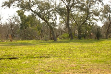 A few trees present on lot.