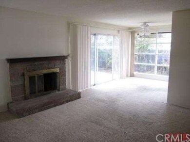 Living room looking into dining area