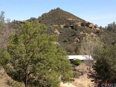 House with rock outcrop.
