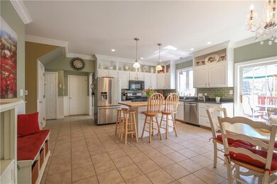 Custom built kitchen with high...