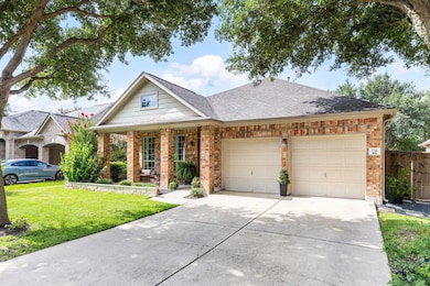 View of front of house with concrete driveway, br