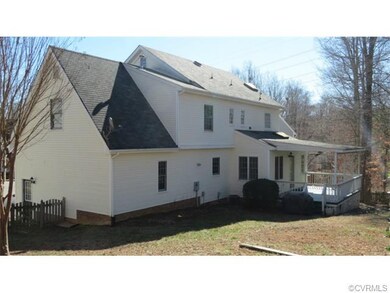 Rear Elevation - Fenced rear yard, covered deck fo