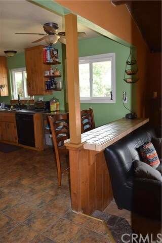 Kitchen Breakfast Bar overlooking the Family Room.