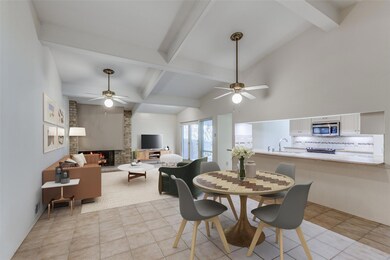 Digitally staged living and dining areas that are 