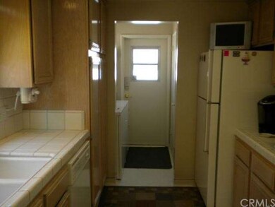 Nicely upgraded kitchen, access to laundry room an