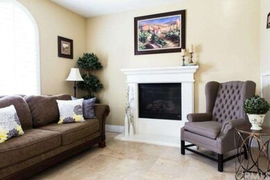 Bright living room with a second fireplace with ma