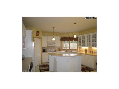Pleasant kitchen offers pantry and desk.