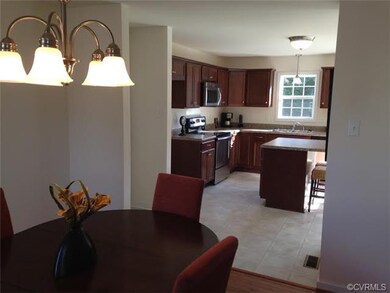 Open to Kitchen Cherry stain cabinets Island with 
