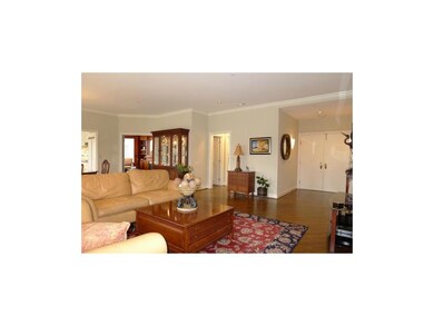 Living Room with view into Study/Den, Hallway to 2