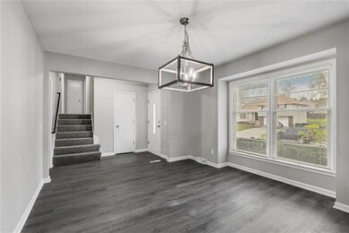 Dining Room with new two tone paint, new flooring 