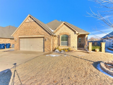 View of front facade with driveway, a front yard, 