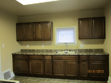 Kitchen with new Cabinets<|><|>
