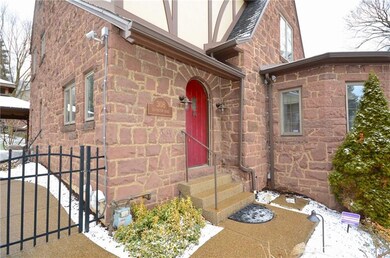 Welcoming front entrance with access to side gate 