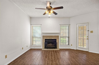 Cozy wood-burning fireplace & no carpet in sight.