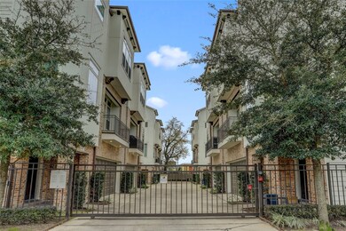 A gated community with guest parking, green spaces