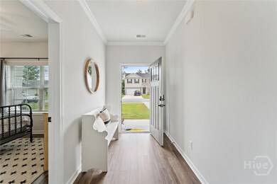 Entryway with view of the main floor guestroom